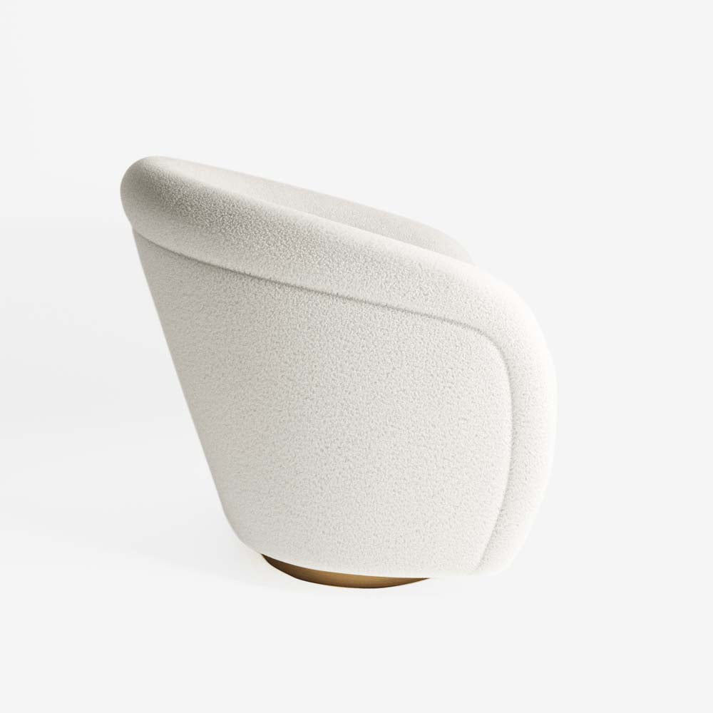 Fauteuil effet laine bouclée et laiton
