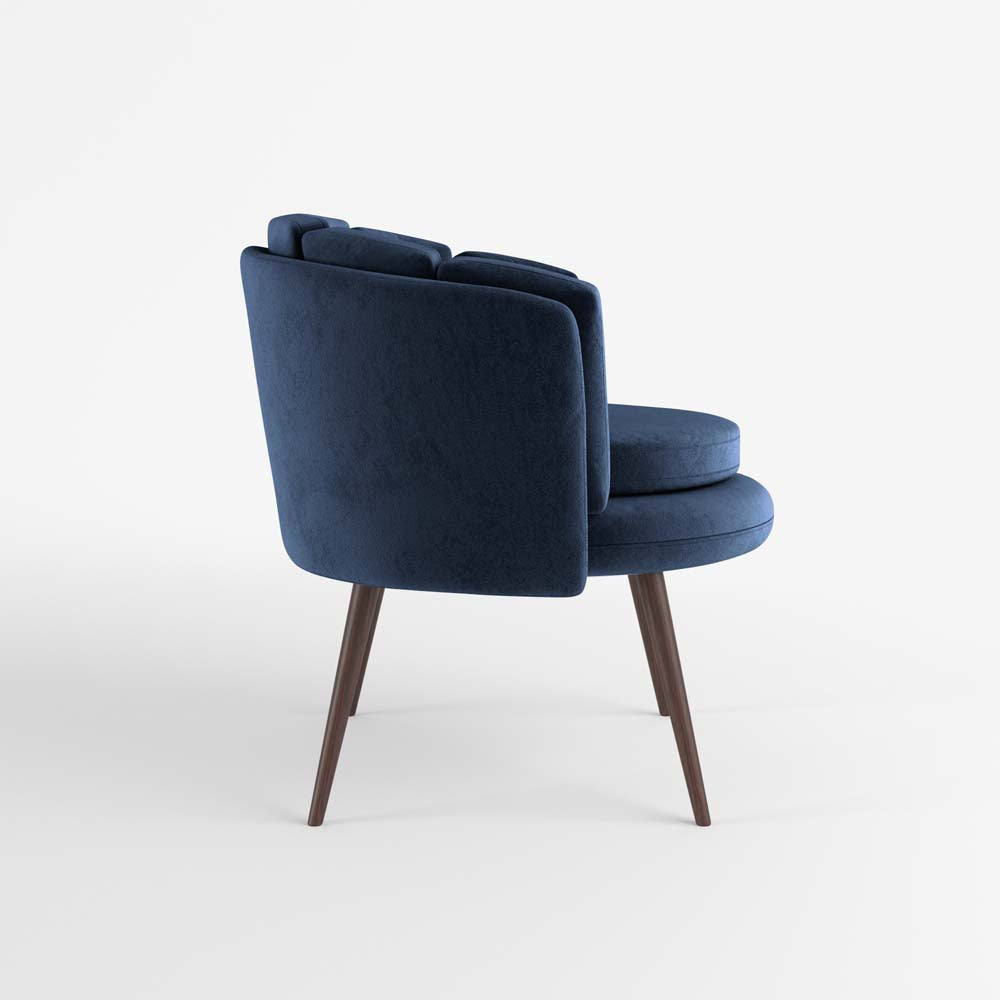 Fauteuil en velours bleu nuit