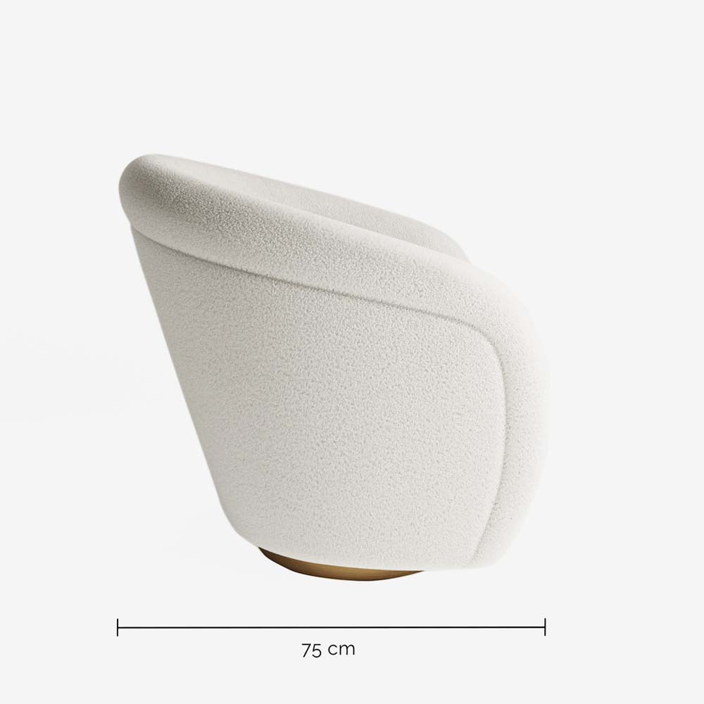 Fauteuil effet laine bouclée et laiton