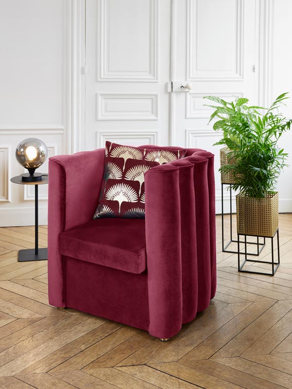 Fauteuil vintage en velours bordeaux