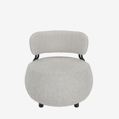 Fauteuil rond en laine bouclée