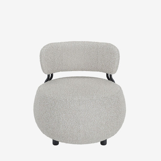 Fauteuil rond en laine bouclée