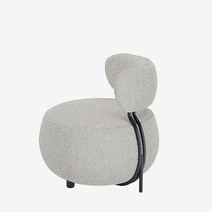 Fauteuil rond en laine bouclée
