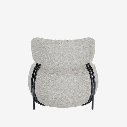 Fauteuil rond en laine bouclée