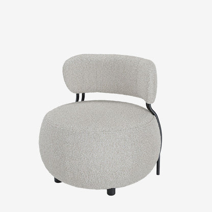 Fauteuil rond en laine bouclée
