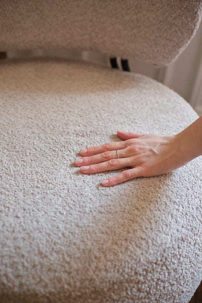 Fauteuil rond en laine bouclée