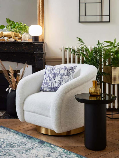 Fauteuil effet laine bouclée et laiton
